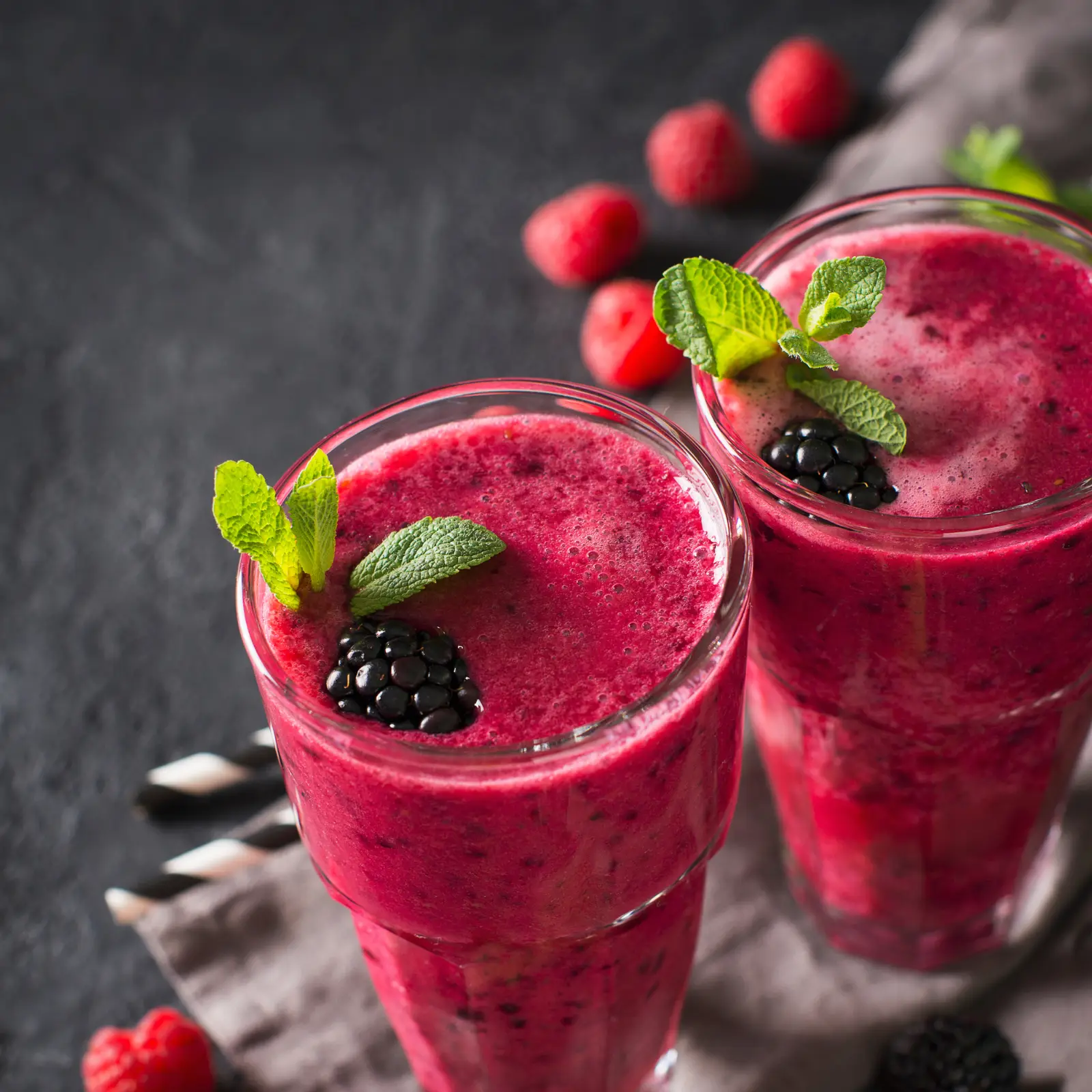 Colorful fruit smoothies and refreshing beverages in glasses