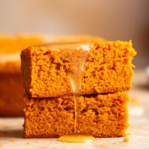 Sweet potato cornbread close up with melted butter